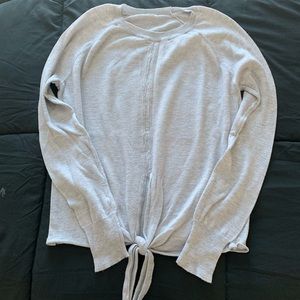 Gray women’s sweater with front tie